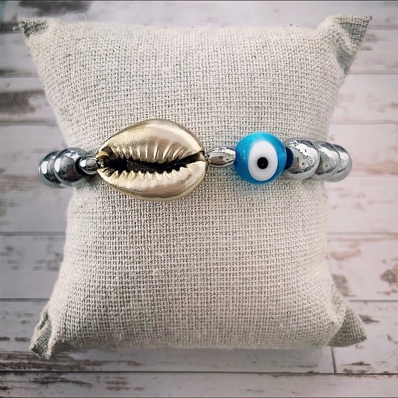 MEET ME IN MYKONOS BRACELET ft. silver hematite, gold seashell, turquoise eye - Picture 2 of 3